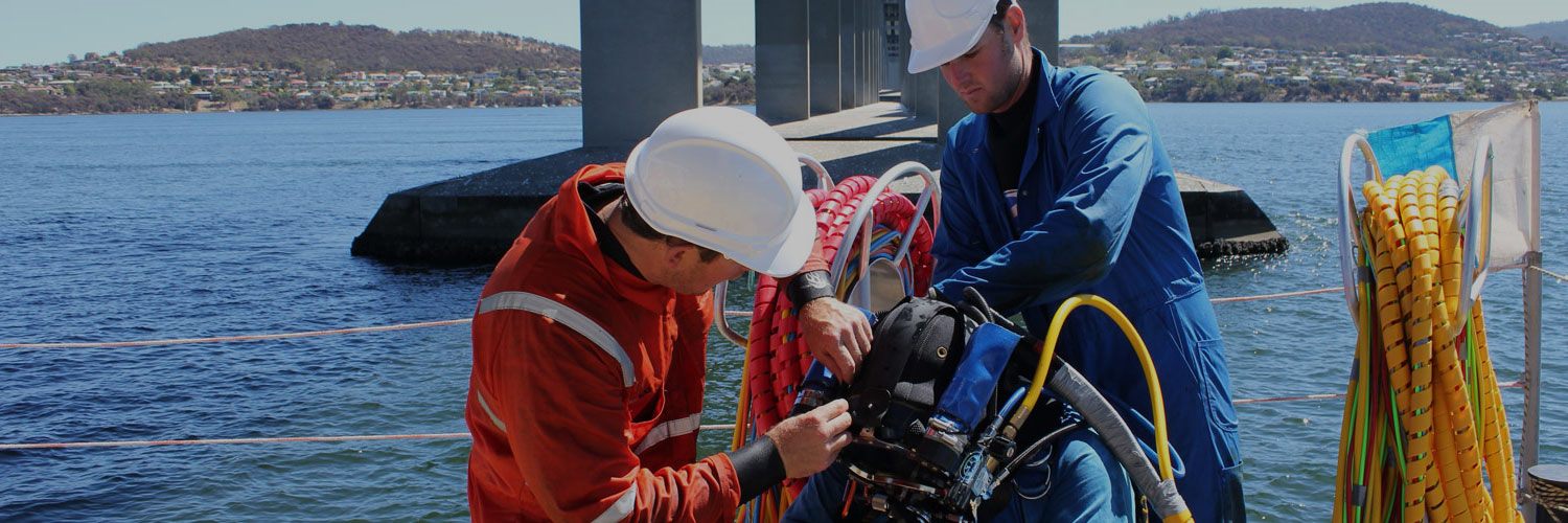 Subsea Access dive team under the Tasman Bridge